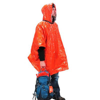 AMK SOL Emergency Poncho in use