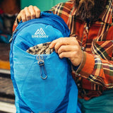 Gregory Miwok Men's 24 Litre Hiking Daypack front stretch mesh pocket