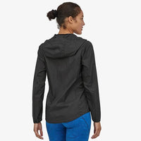 Patagonia Women's Houdini Wind Jacket in use Black rear view