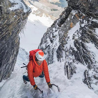 Rab Men's Microlight Down Hoody in use ice climbing