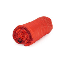 Grand Trunk Tech Throw Travel Quilt Blanket Bright Crimson rolled up