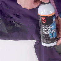 Revivex Durable Water Repellent Spray Bottle in use