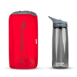 Sea to Summit Comfort Plus Insulated Inflatable Sleeping Mat packed next to water bottle